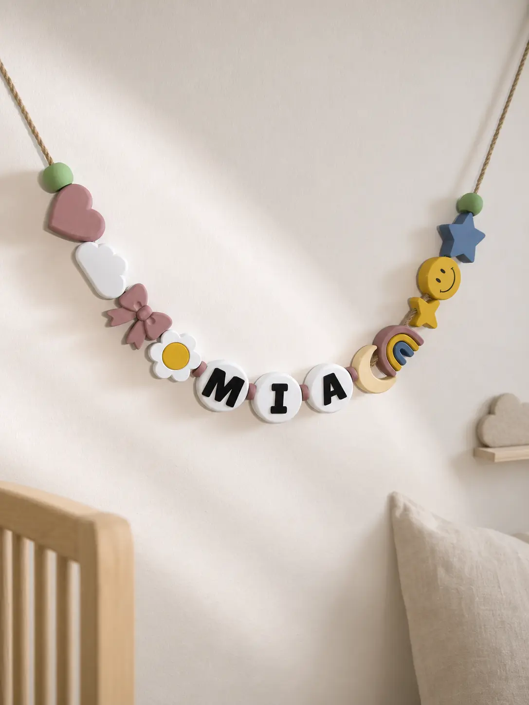 Complete personalized MIA garland above a child’s bed