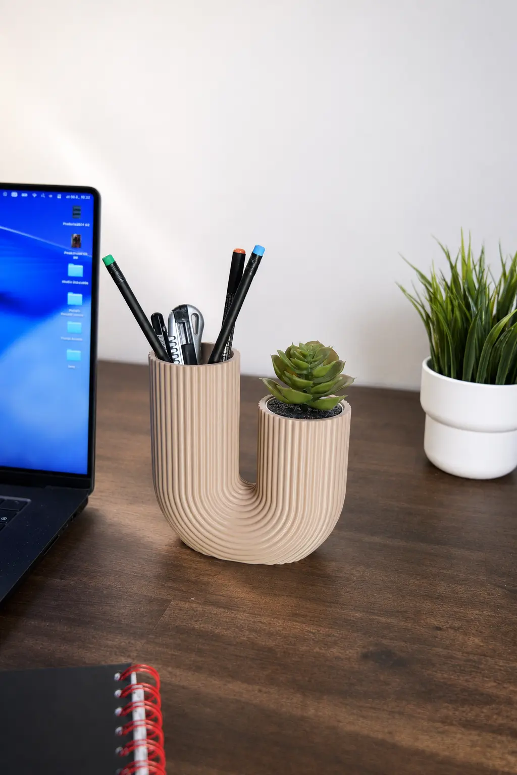U-FORM organizing pens beside a laptop