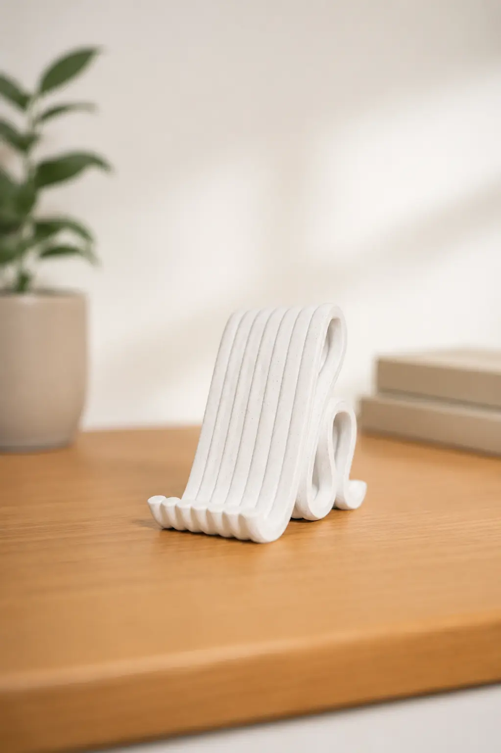 White WAVE phone stand viewed from the rear
